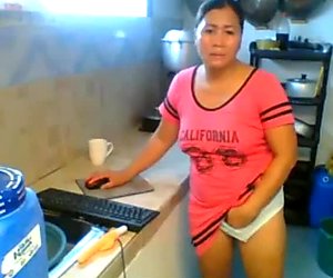 Mature pinay plays with her pussy thru her panties. Nice boobs.