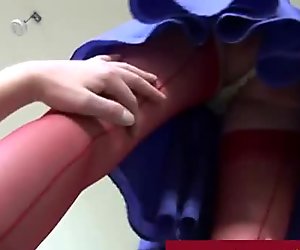 Facesitting by brunette with red stockings